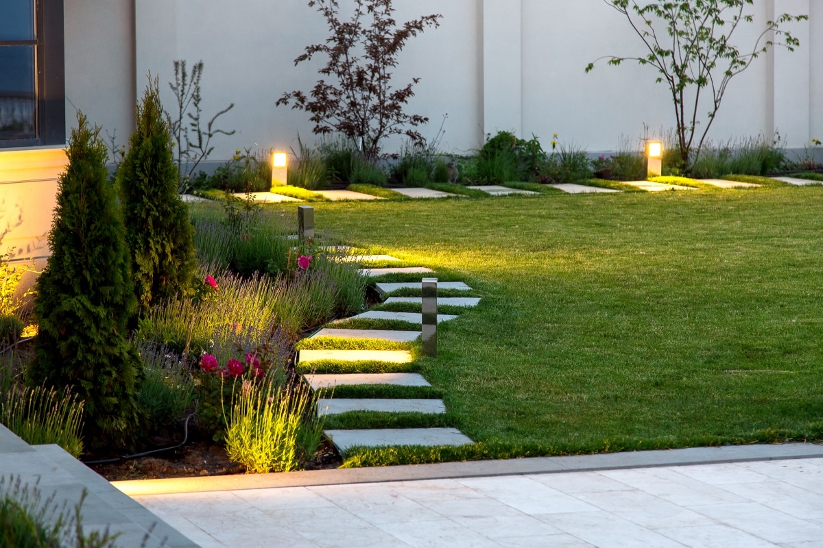 discreet floor light by walkway