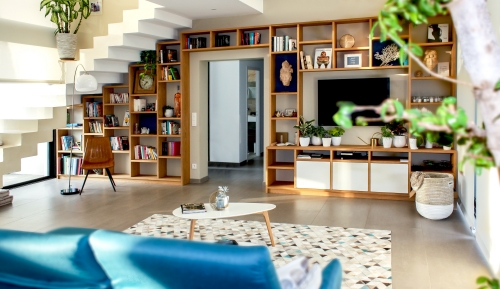 custom shelves installed in a spacious living room