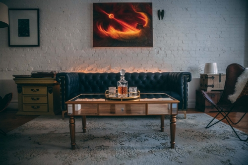 vintage-themed living room with white backdrop