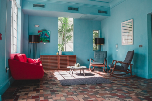 blue-themed living room with accent furniture