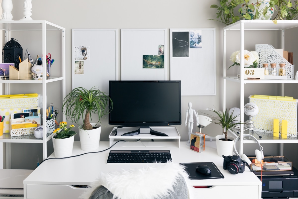shelving on both sides of a desk
