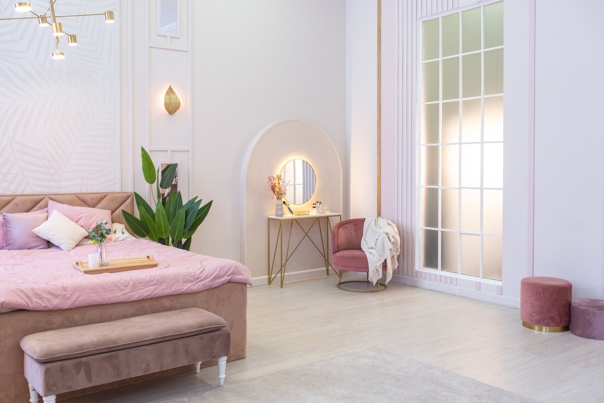 spacious luxury apartment bedroom in pink colors
