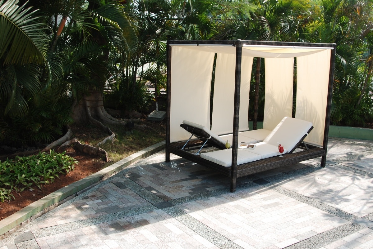 classy sunbed canopy at a garden