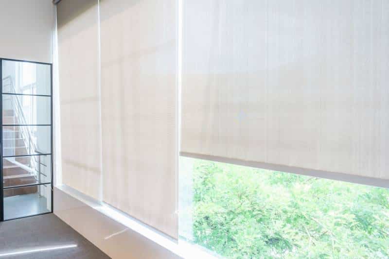 sheer roll blinds on the windows, the sun does not penetrate the house