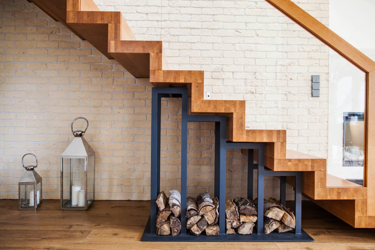 storage pile of wood under the stairs at home