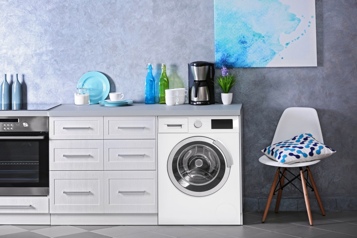 interior of modern kitchen with washing machine