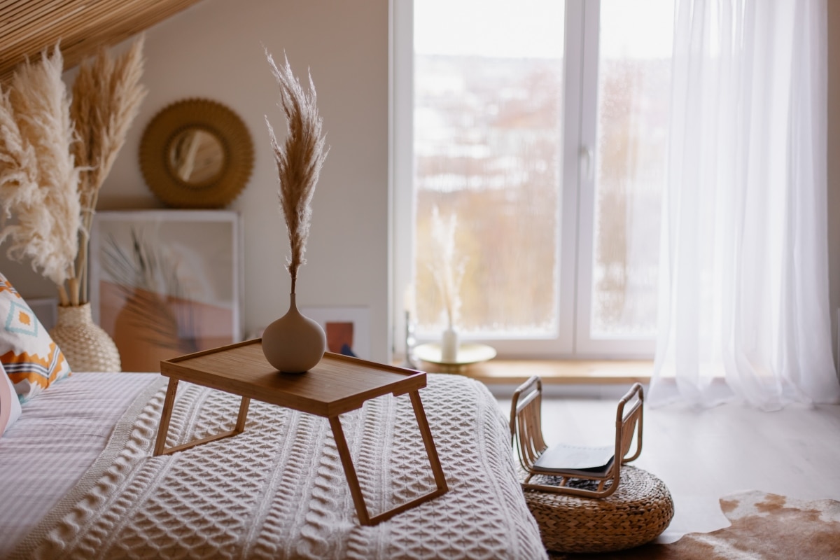 vased pampas in boho bedroom