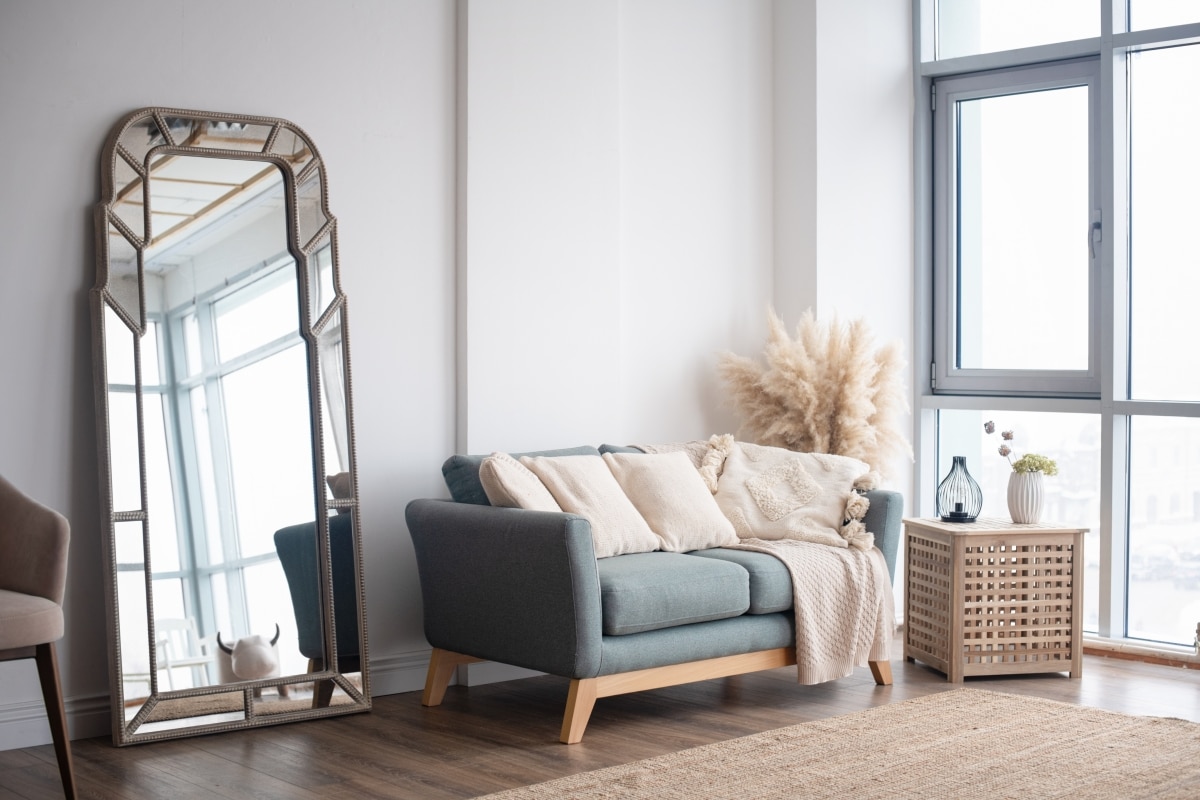 stylish arched mirror in boho living room