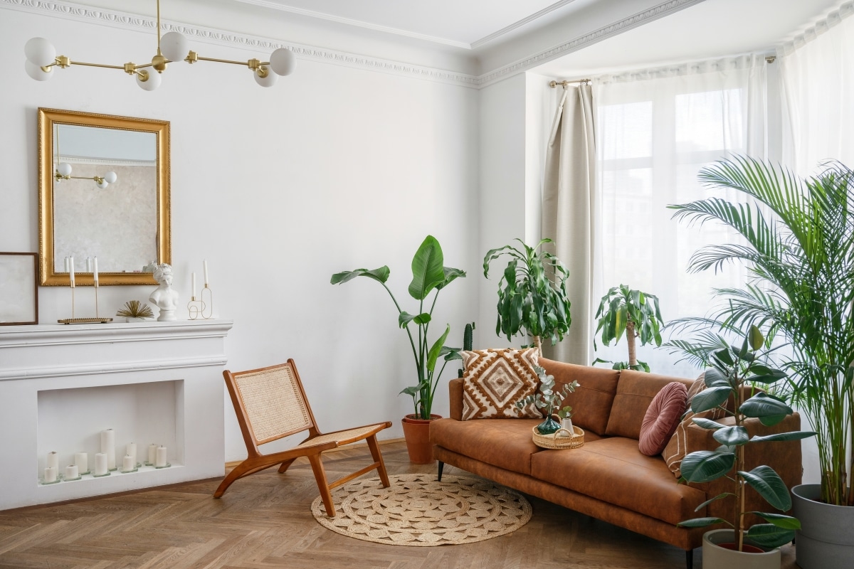 gold accent mirror frame in boho living room