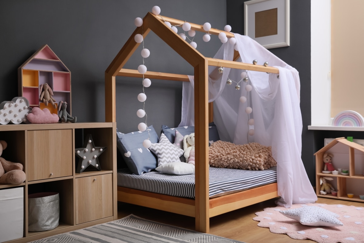 stylish sheer draping over cosy bed