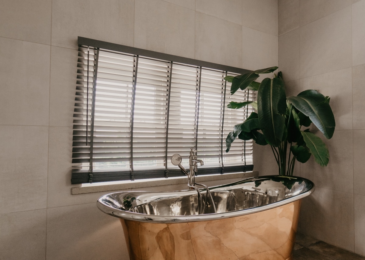 wooden blinds by the tub