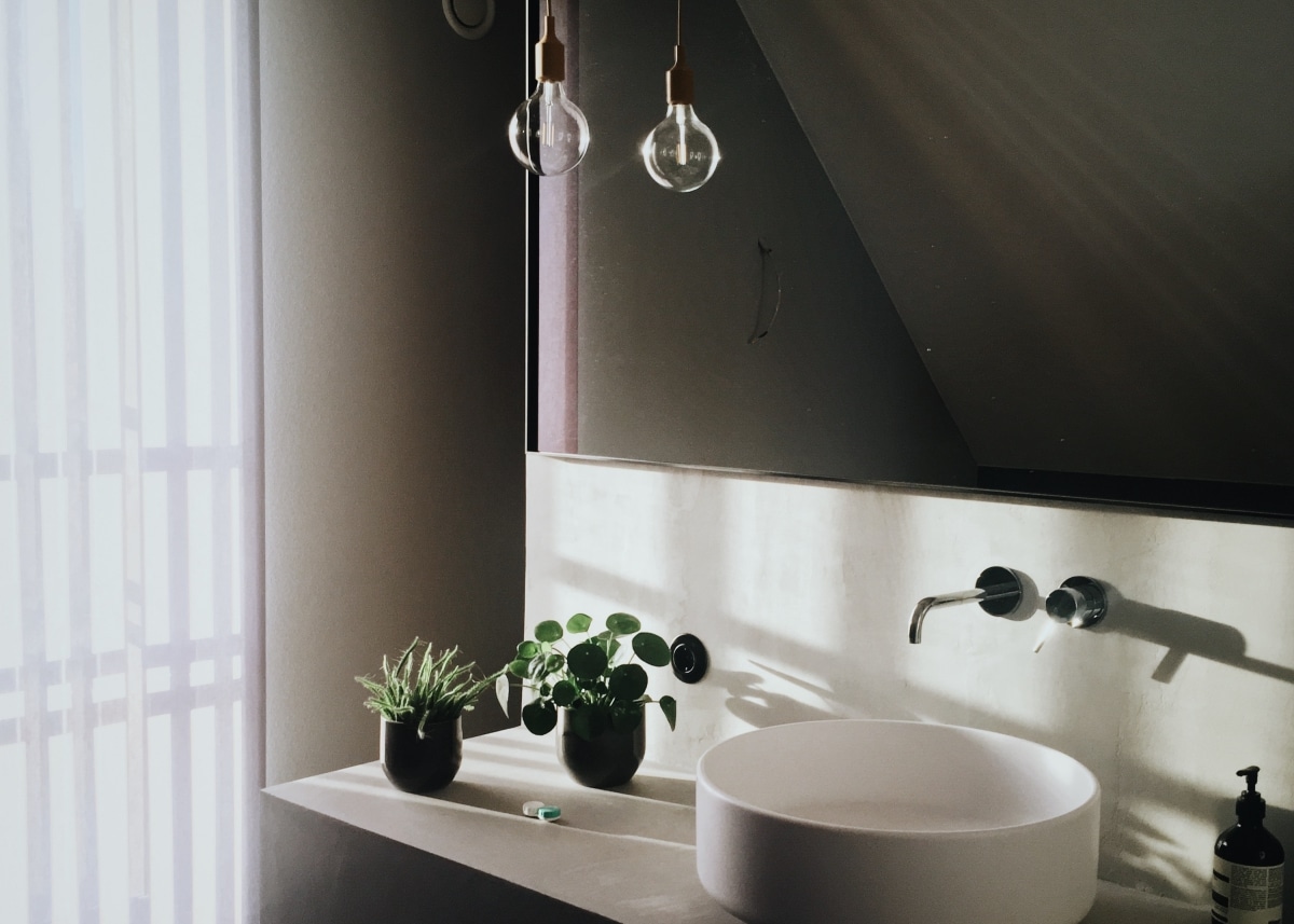 bathroom with sheer curtains