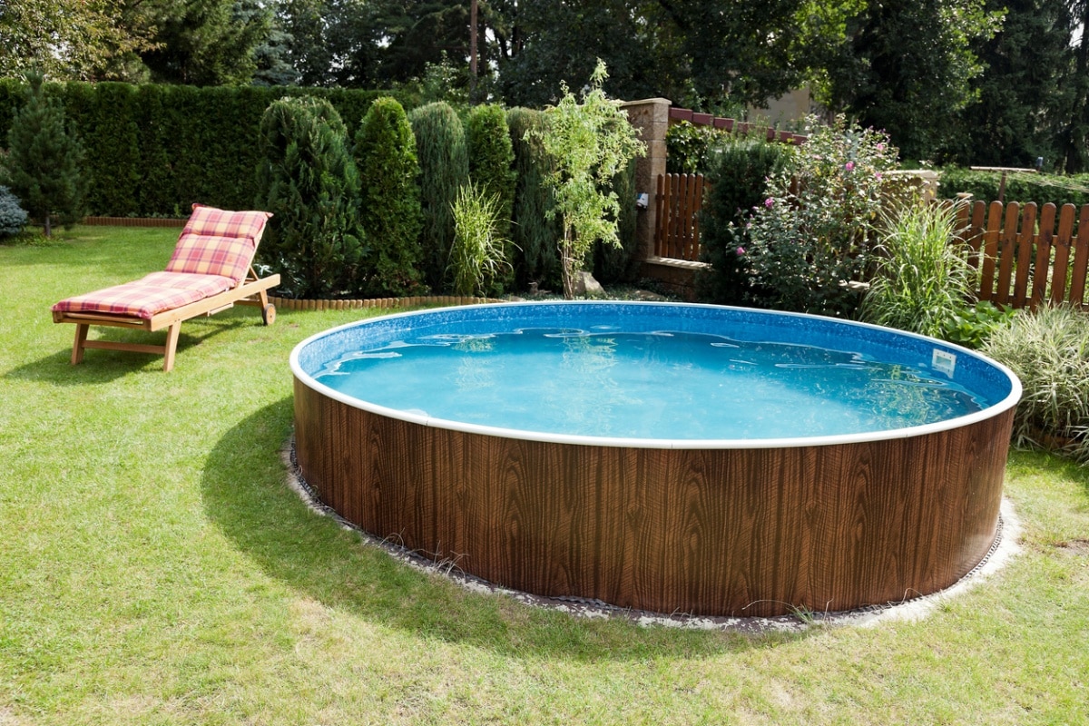 pool with timber detail near deckchair