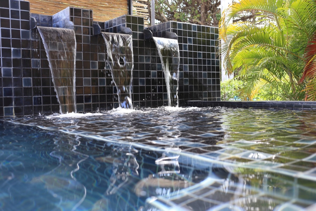 flowing water decorated in swimming pool