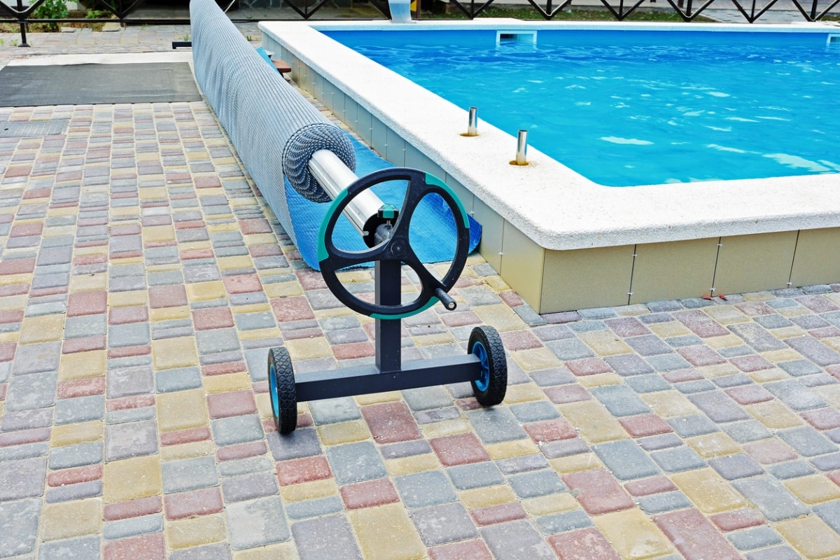 Blue tarpaulin pool cover