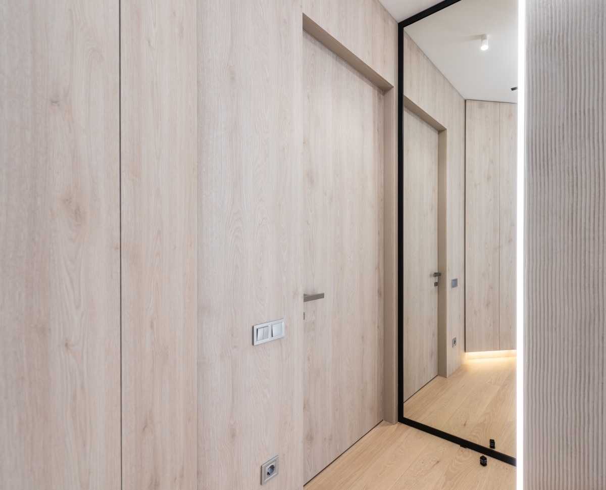 floor-length mirror in a narrow hallway