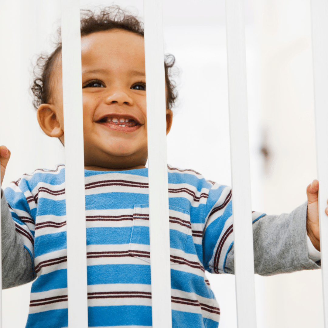 a baby boy safe in a crib