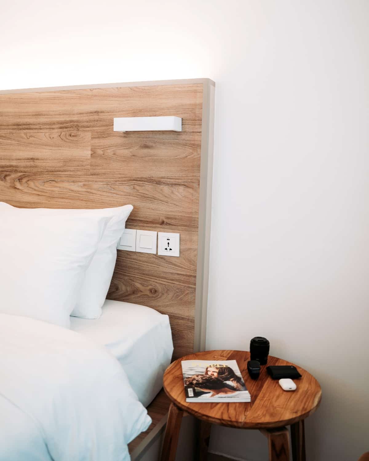Headboard with integrated power plug and light switches