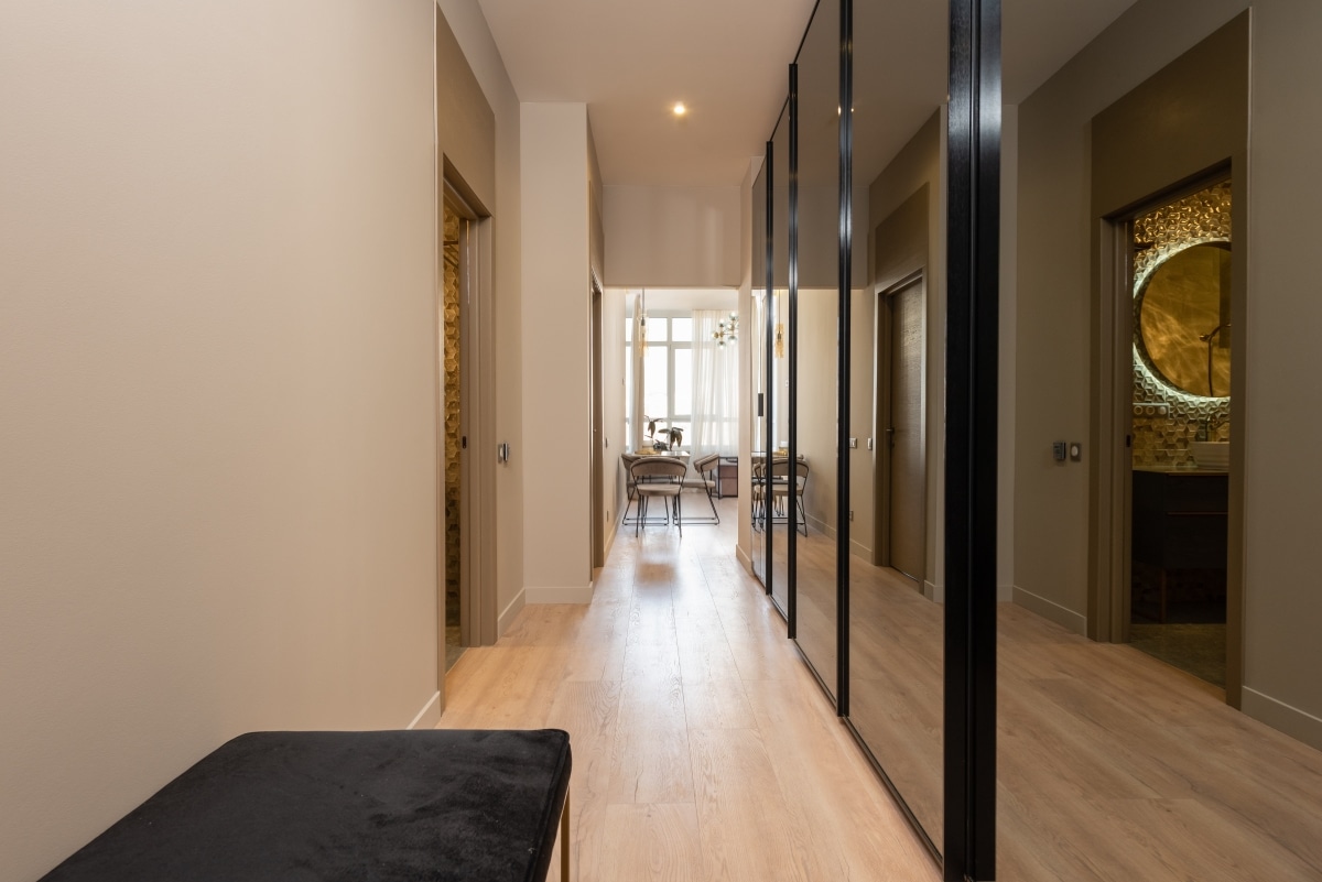 floor to ceiling mirrors in hallway