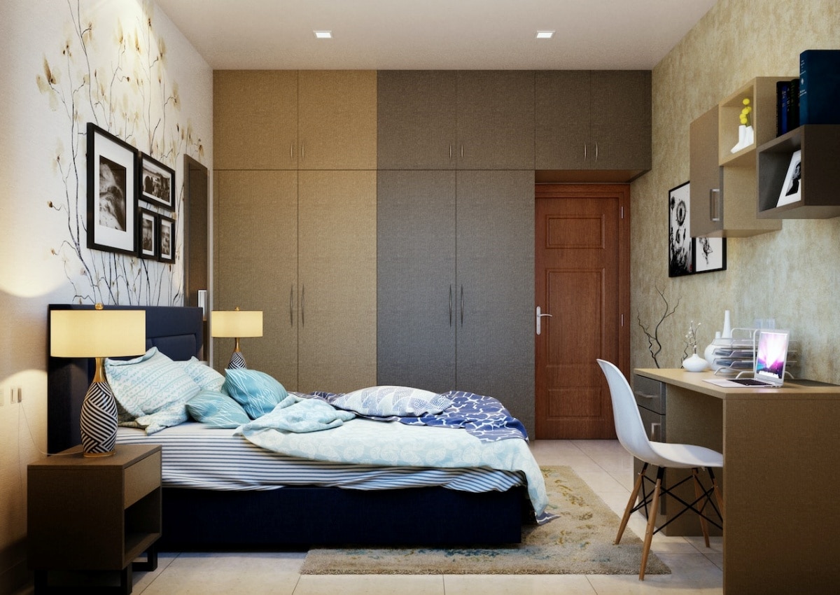 Bedroom with built-in wardrobe and a study table