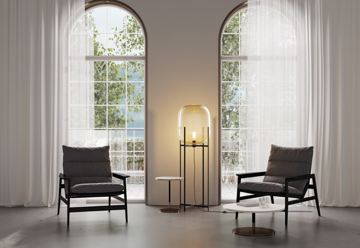modern grey interior with black chair, arch window and garden
