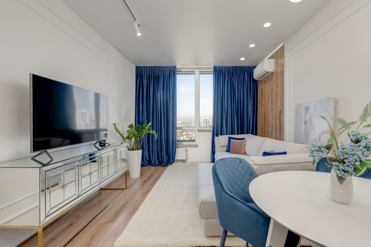 modern living room with blue curtains