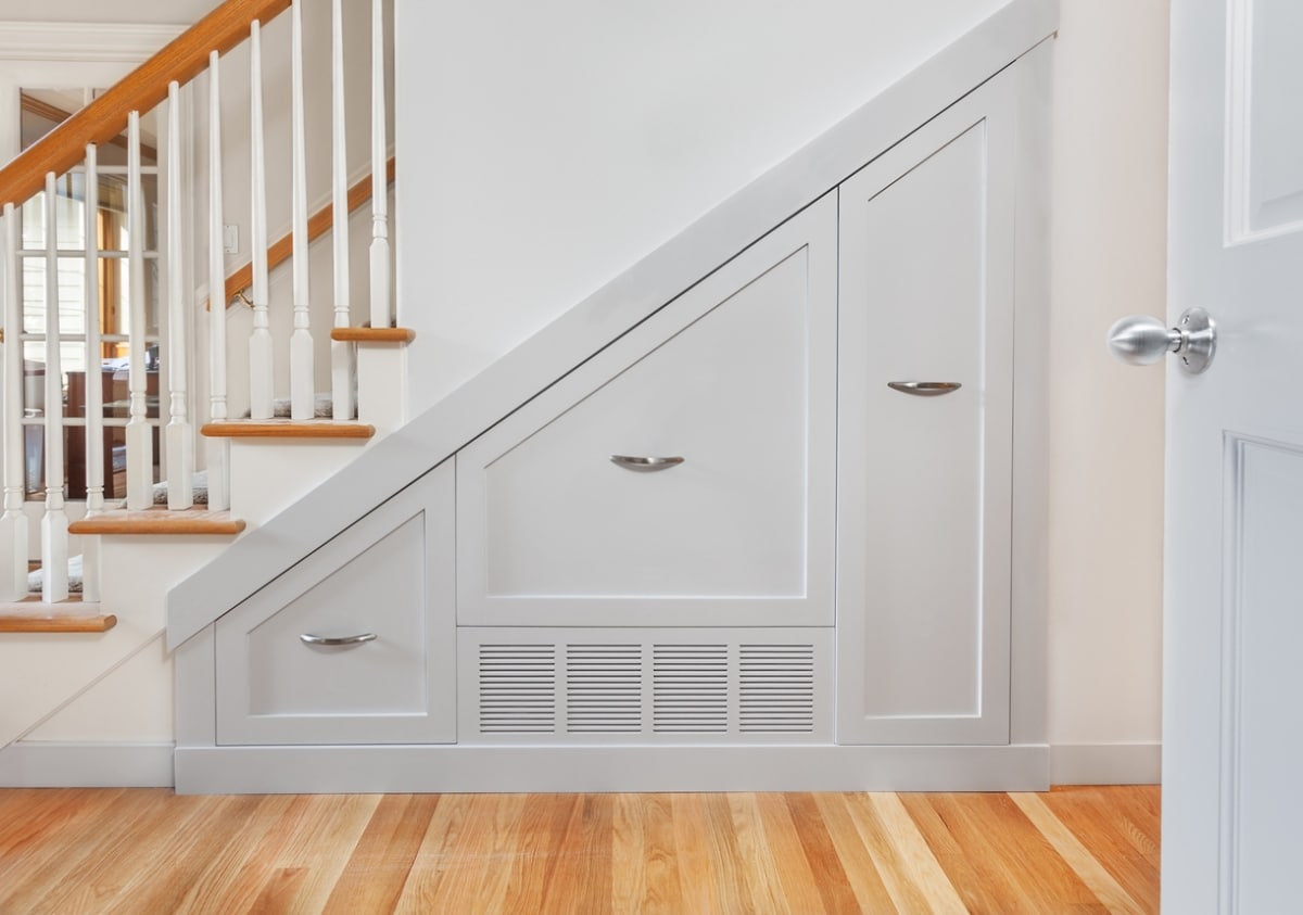 hidden pullout storage under the stairs