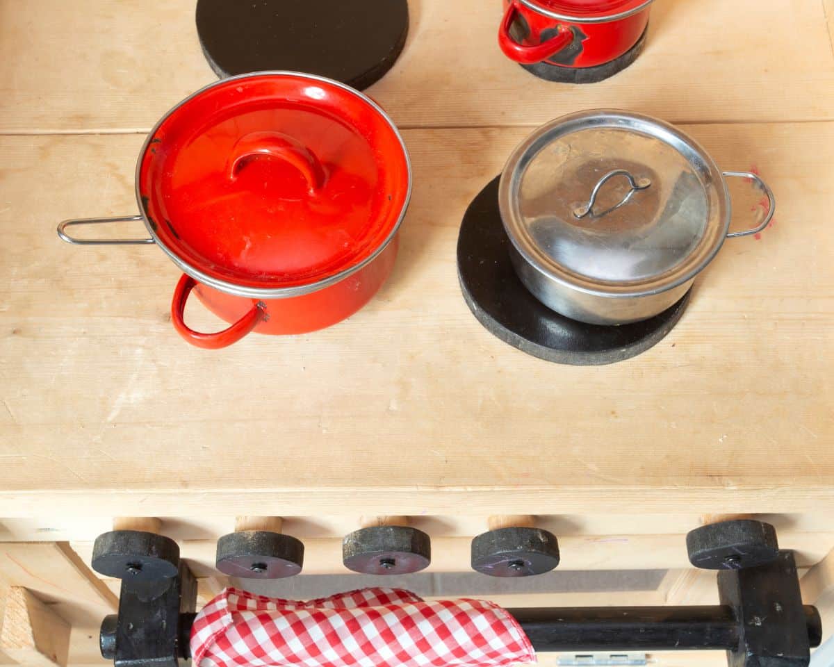 toy kitchen stove with pots