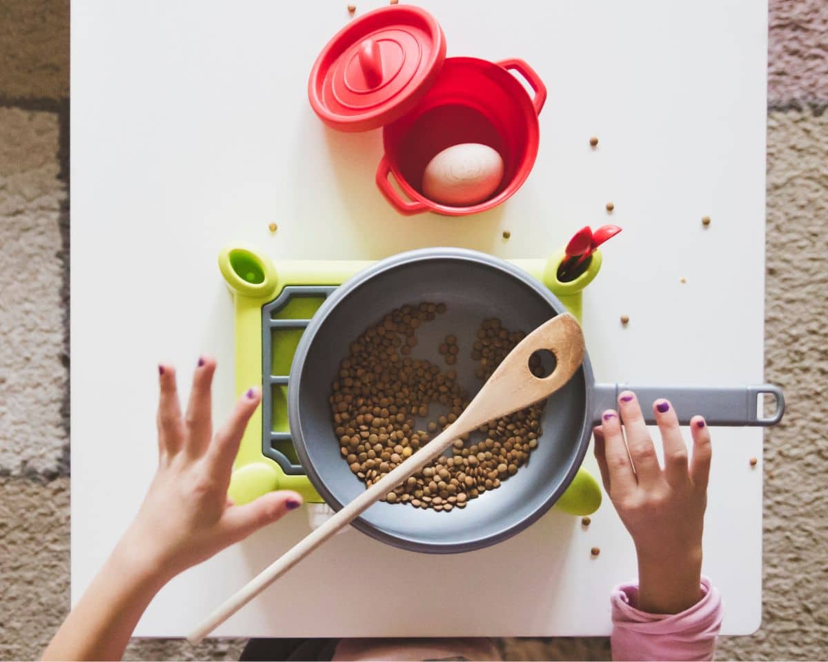 pebbles in toy kitchen