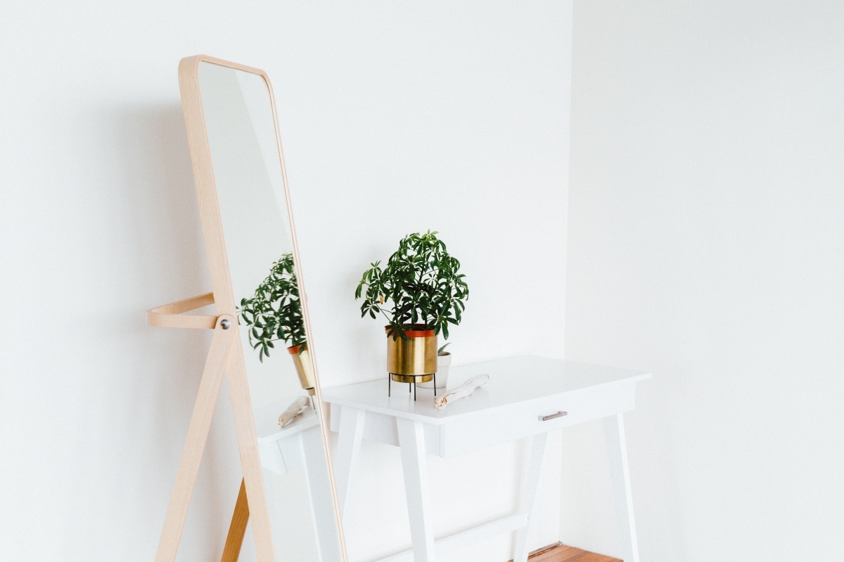minimalist hallway mirror and console