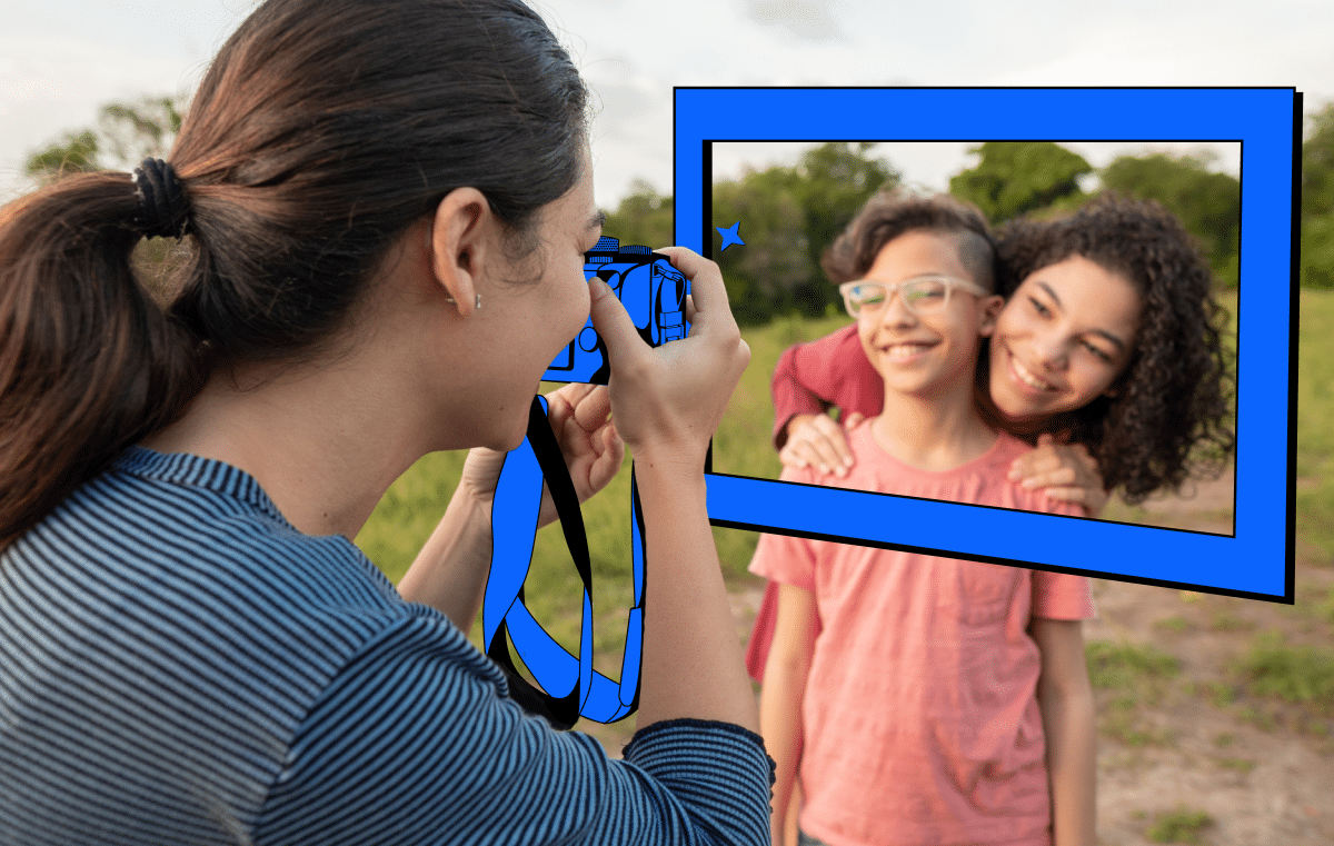 a Tasker taking a photo of two kids