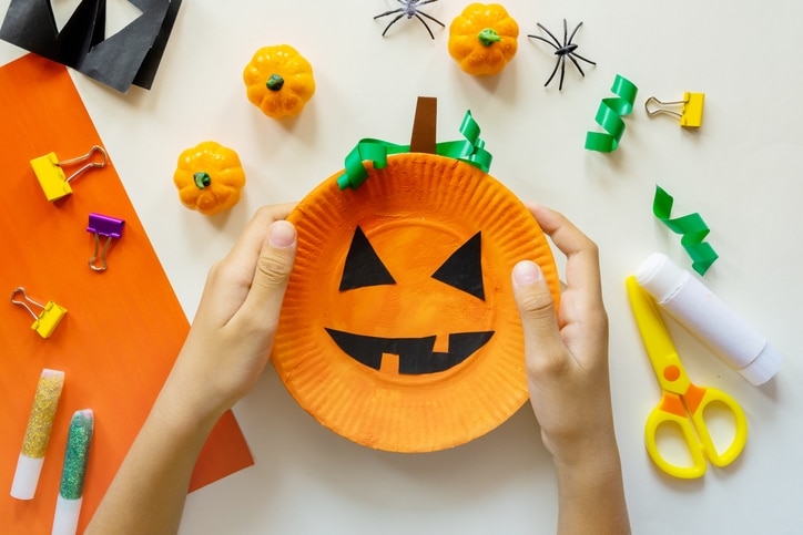 DIY Halloween decor made from paper plates and other every day items.